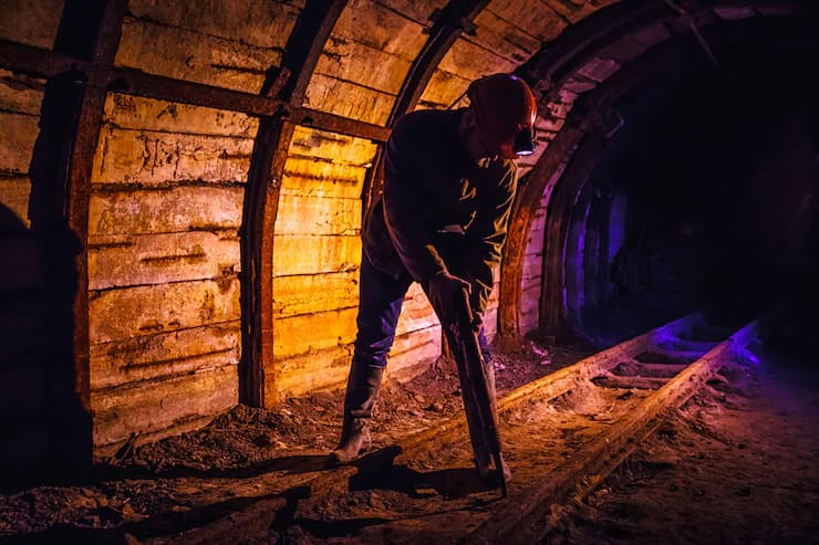 Mine worker in a mine underground